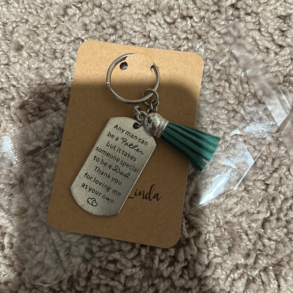 Keychain with green tassel